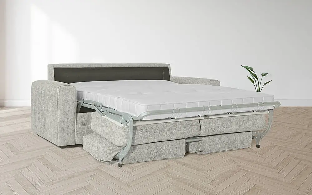 The Gainsborough Pisa Sofa Bed unfolded in a minimalist guest bedroom.